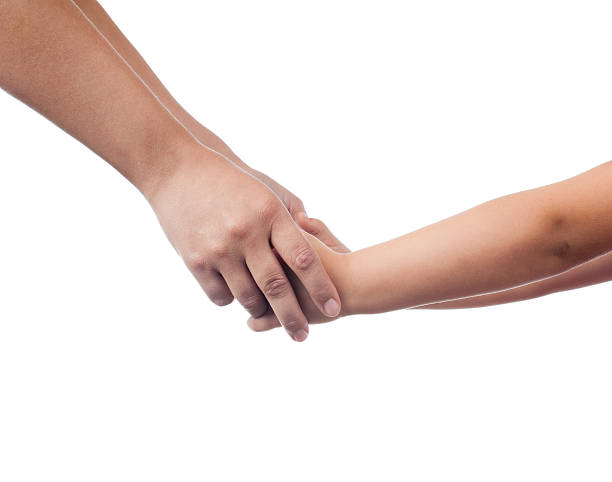 istock mother and her child holding hands 135360146