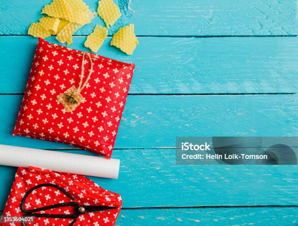 Take Away Sandwich Inside Homemade Beeswax Wraps Wrapping Food In Handmade Beeswax Wrap Cloth Indoors Alternative For Plastic Lot Of Copy Space Stock Photo - Download Image Now