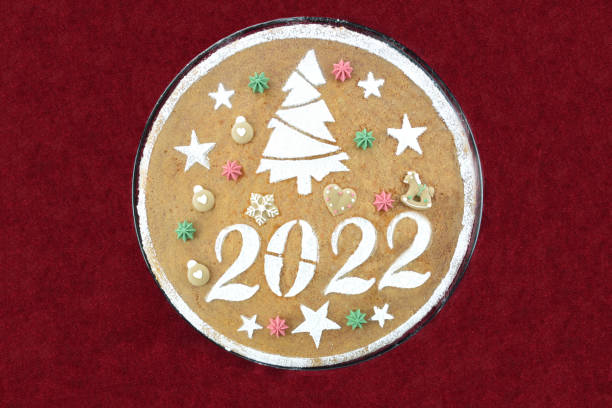 istock New year's cake for 2022 on red velvet tablecloth 1353605933