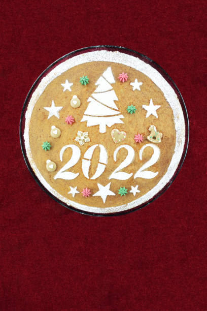 istock New year's cake for 2022 on red velvet tablecloth 1353606210