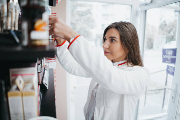 istock The pharmacist arranges the medication 1353606364