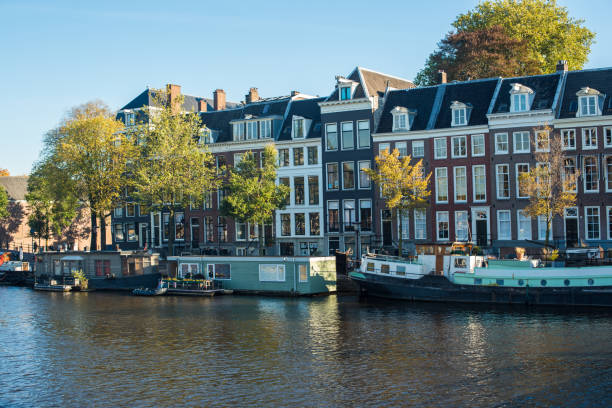istock canal with boats and houses 1353607708