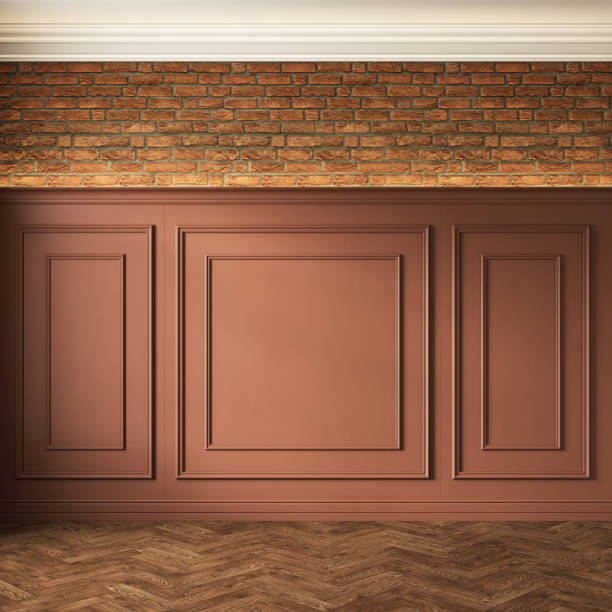 istock Classic loft interior with orange wall panel, moldings and brick wall. 3d render illustration mockup. 1353609480