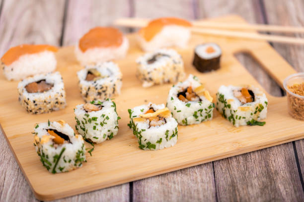 istock Range of sushi and sashimi on a board 1353611697