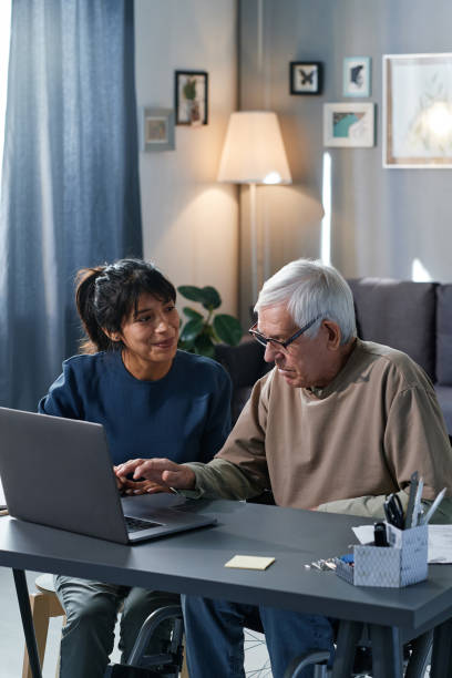 istock Senior man learning to do online shopping 1353613024