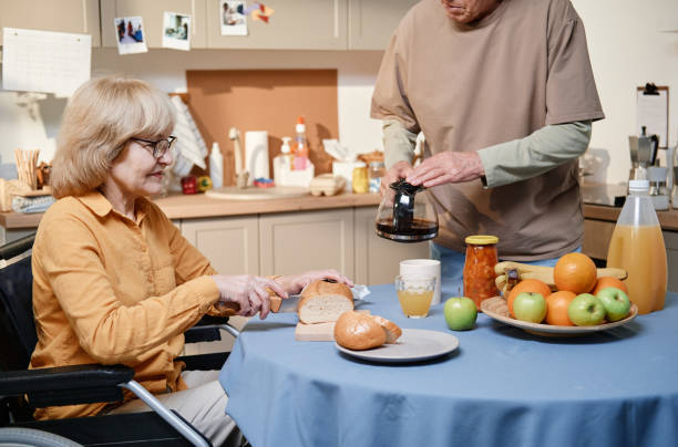 istock Senior couple cooking breakfast together 1353613409