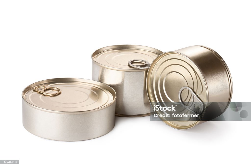 Three metallic goods can with key Three metallic goods can with key. Isolated on white. Aluminum Stock Photo