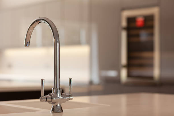 istock Chrome monobloc tap in tight focus 1353614671