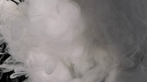 istock White cloud of ink. Magic white abstract background. White watercolor paints 1353615576