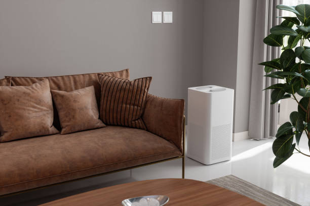 purificador de aire en la sala de estar para obtener aire fresco, vida saludable y eliminar el polvo - air quality fotografías e imágenes de stock