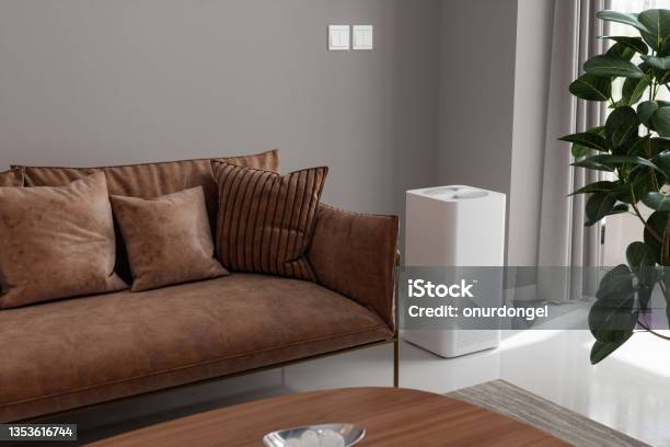 Air Purifier In Living Room For Fresh Air Healthy Life And Removing Dust Stock Photo - Download Image Now