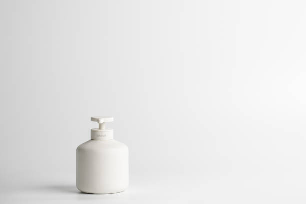 istock White minimalistic ceramic dispenser with pump for sanitiser. COVID-19 Coronavirus concept. Virus prevention, personal hygiene routines 1353618432