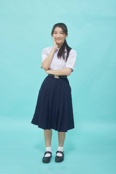 istock portrait of Thai high school student in student uniform 1353618936
