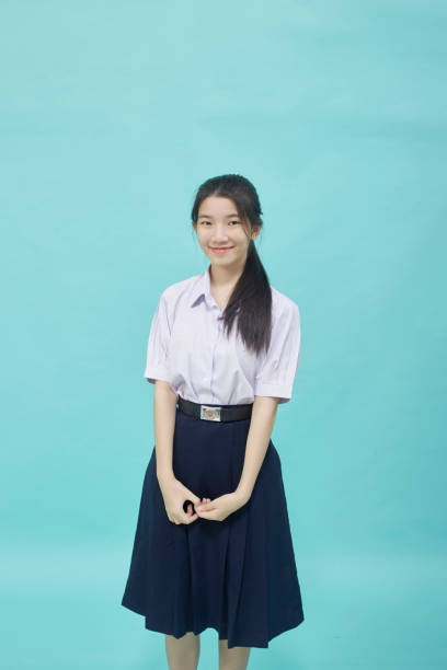 istock portrait of Thai high school student in student uniform 1353618943
