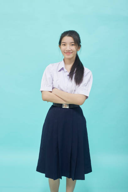 istock portrait of Thai high school student in student uniform 1353618948