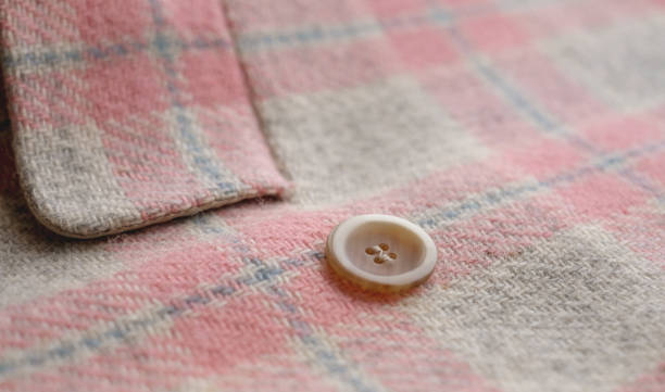 istock Details of a fabric plaid wool jacket, close up 1353619668