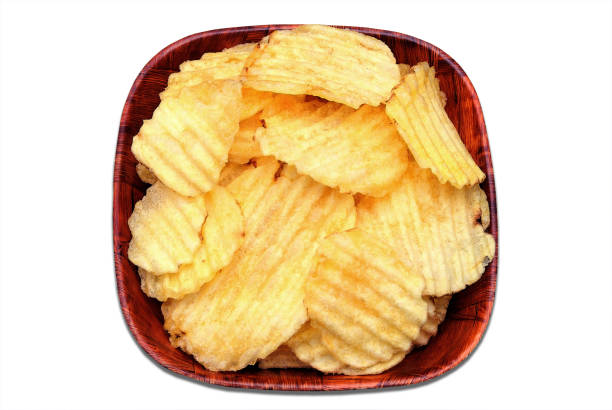 istock Ribbed potato chips in a bowl 1353619858