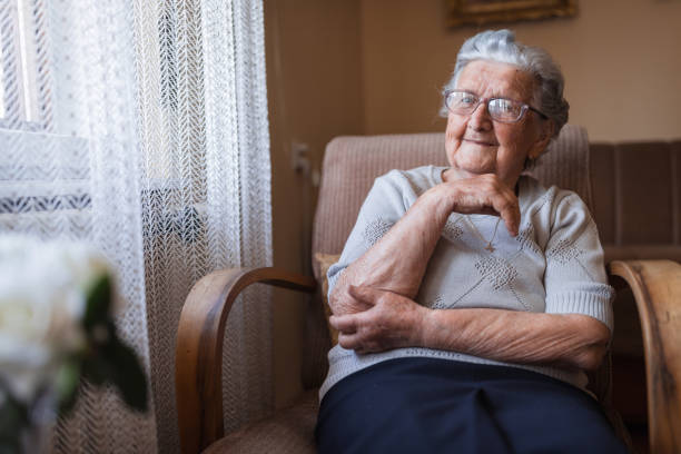 istock Happy senior woman resting 1353625106