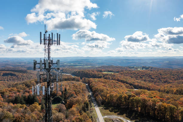 Cell phone or mobile service tower in forested area of West Virginia providing broadband service stock photo
