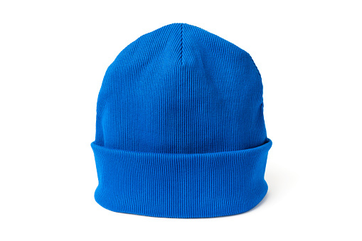 Electric blue beanie hat made from natural eco-fabric in ribbed. Isolation on a white background. Side view. Volume