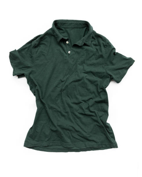 Wrinkled polo shirt against white background
