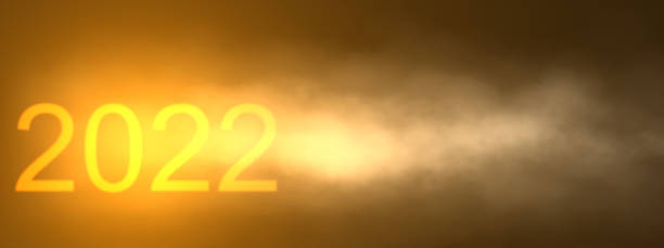 istock 2022 Golden and black glow new year background include light dark cloud smoke steamer and glitter 1353631290