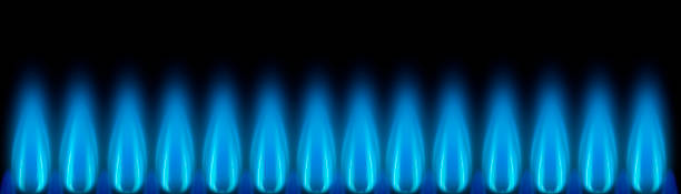 istock Blue gas flames as banners against a dark background 1353633364