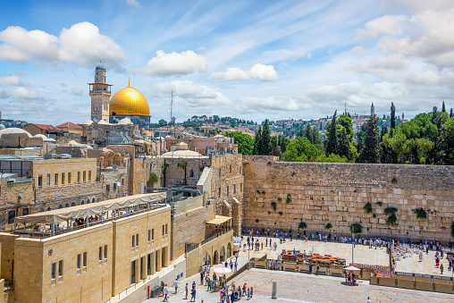 Jerusalem, Israel - November 16, 2021; Elevated view of the Western Wall, also known as the Wailing Wall, and the Al-Aqsa Mosque, which is considered as the third holiest site in Islam.