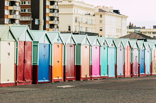 Multi colored each huts in a row in Brighton, England.