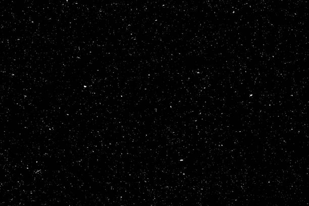 istock Abstract grainy texture isolated on black background. Top view. Dust, sand blow Silhouette of spread on the flat surface or table. 1353635508