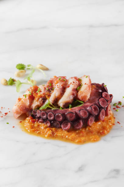 istock Tomato Braised Octopus with Romesco Sauce 1353638491