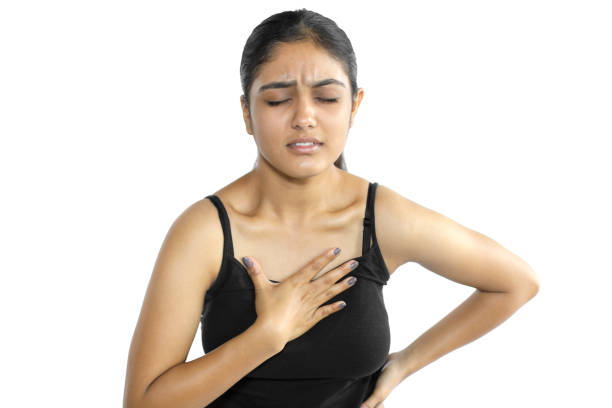 Female Clutching Chest in Pain
