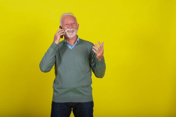 istock Studio portrait of a senior man telephoning 1353646912