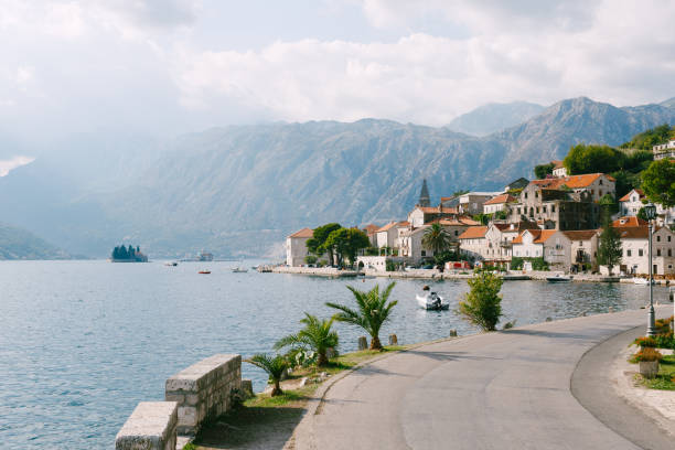 istock Perast coastline with old stone houses among greenery. Montenegro 1353649916