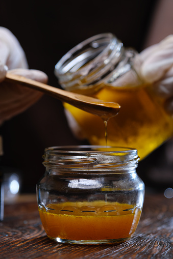 Making DIY beauty facial mask with turmeric and honey
