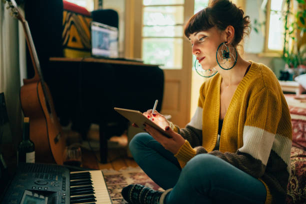 Young woman composing new music