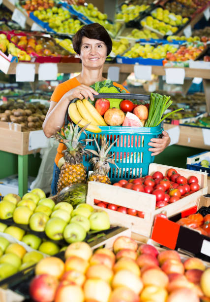 istock Positive woman is demonstraiting basket 1353652387