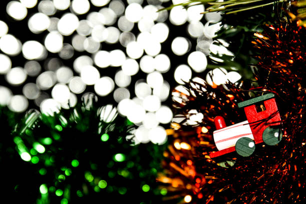 istock Christmas decoration hanging on pine tree 1353654277