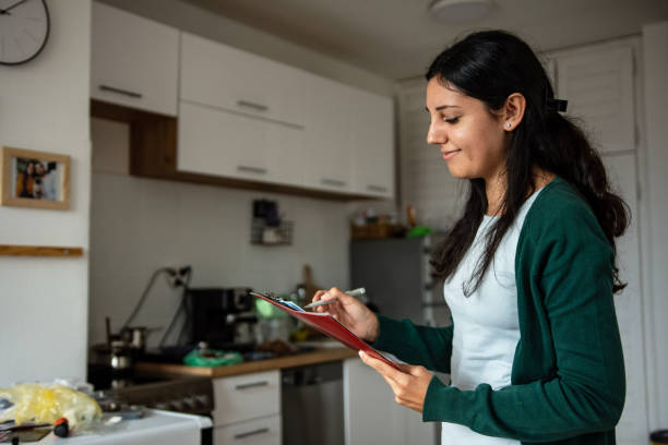 istock Young woman working from home 1353655564