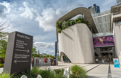 Miami, Florida, United States - November 16, 2021: View of The Phillip and Patricia Frost Museum of Science opened on May 8, 2017 adjacent to the Perez Art Museum. This science museum, planetarium, and aquarium is located at Museum Park, Miami, Florida, US.