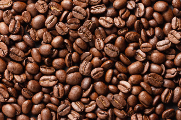 istock texture of coffee beans immediately after roasting 1353657582