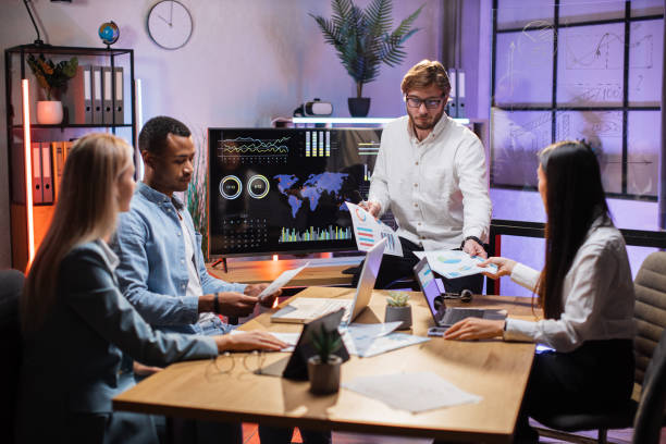 istock Diverse company workers having conference at office 1353659864