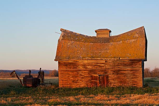 istock old abandoned farm building and antique machine 135366147