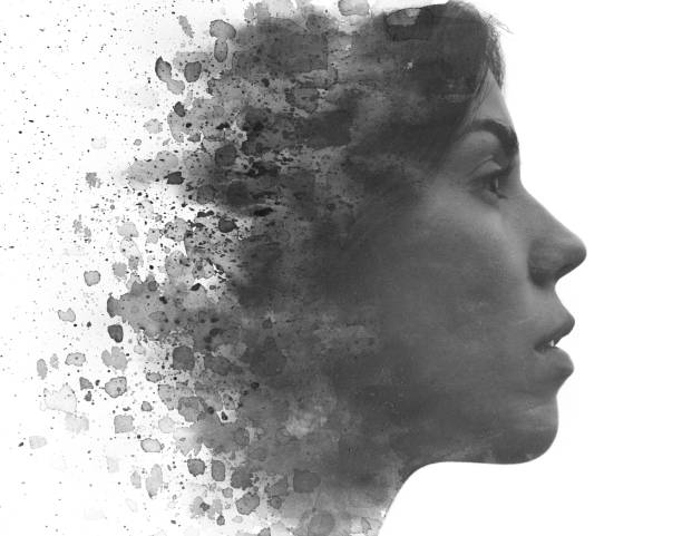 istock Paintography. Artistic composition created by combining ink painting with a portrait 1353662494