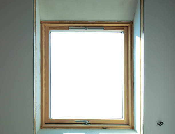 istock large wooden dormer window with bright white light 1353666637