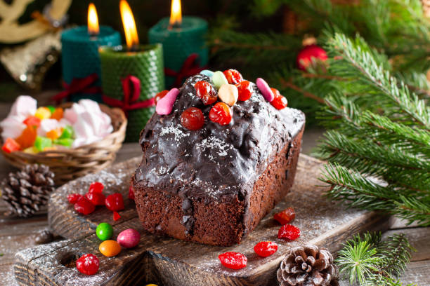 istock Traditional Christmas cake on wooden table 1353666971