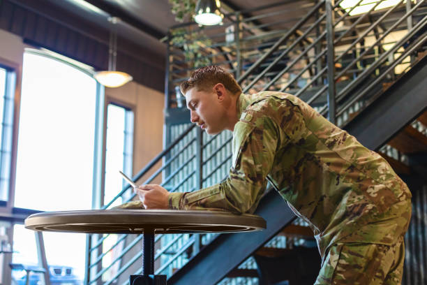 istock Professional Working Caucasian Male National Guard Officer in Office Setting Using Technology Photo Series 1353667219
