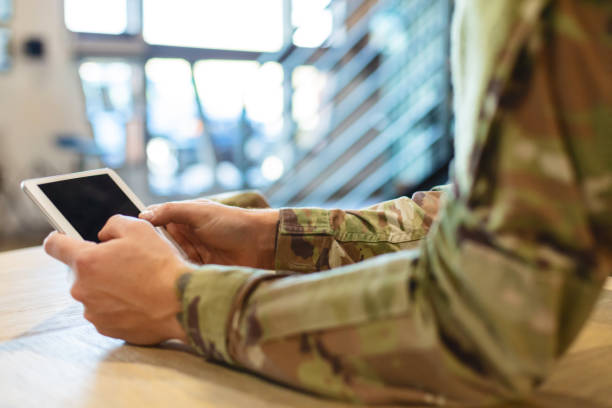 istock Professional Working Caucasian Male National Guard Officer in Office Setting Using Technology Photo Series 1353667263
