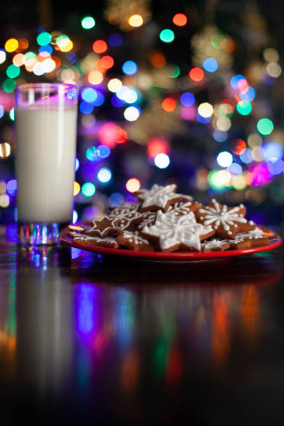 Christmas Gingerbread stars cookies infront Christmas tree