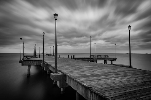 long exposure photo of wooden pier at Baltic sea